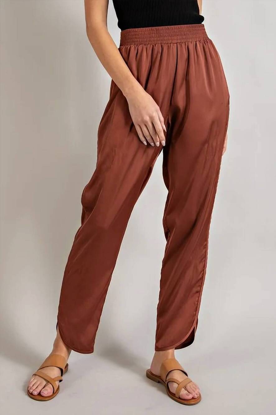 NEW EE:SOME smocked satin pants in rust